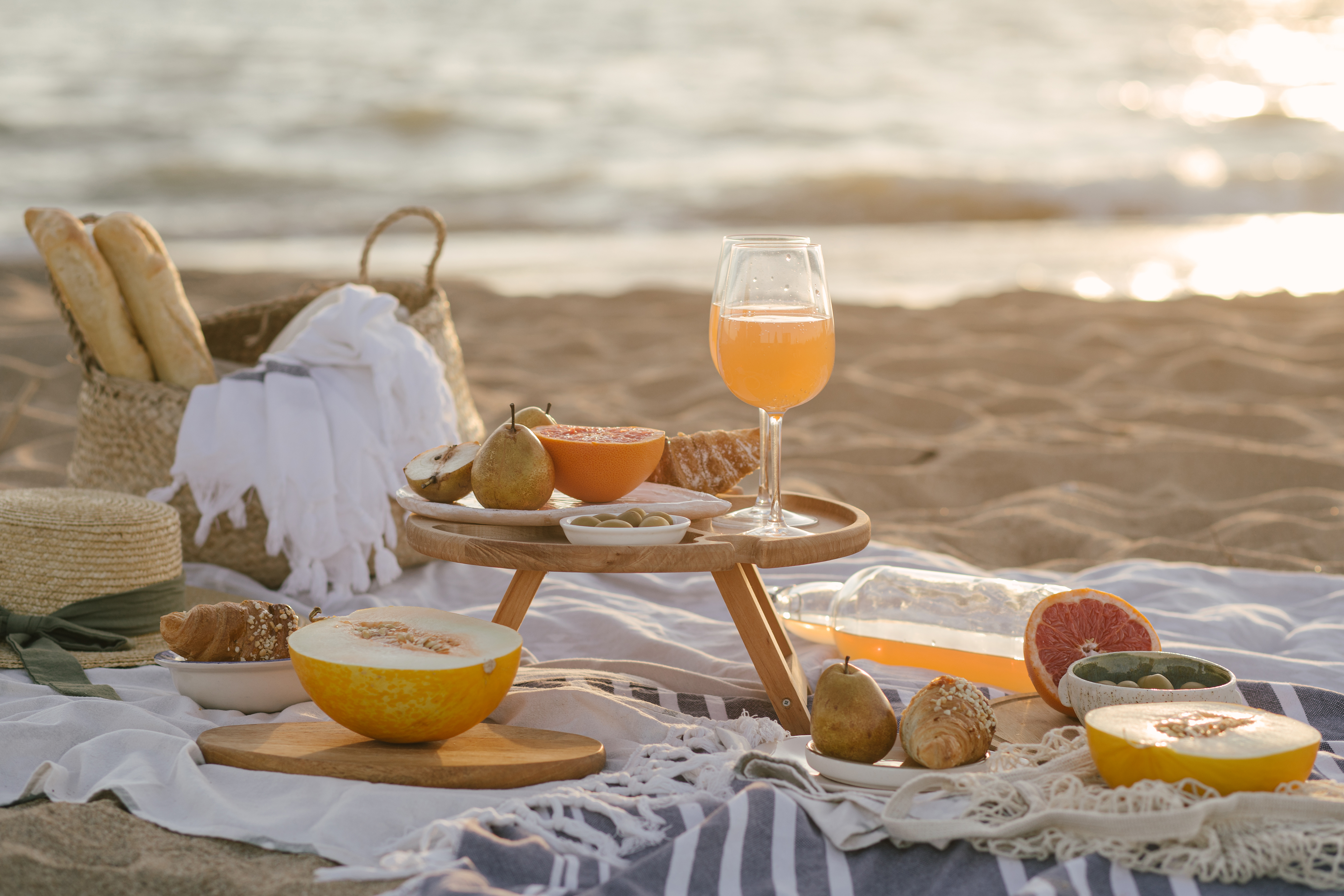 Fresh fruit picnic setup with lemonade